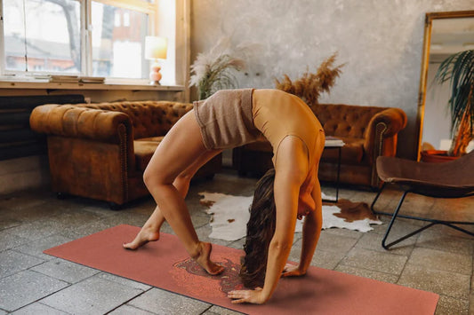 woman doing yoga practice using cork yoga mat
